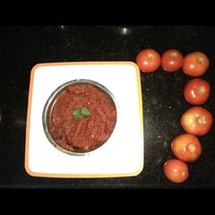A picture of Tomato dry curry.
