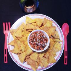 A picture of Nachos With Tomato Salsa.