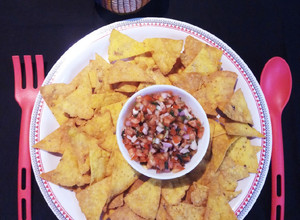 A picture of Nachos With Tomato Salsa.