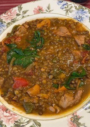 Una foto de Lentejas al curry con boniato y pollo en olla GM de Luxe