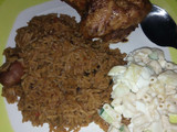 Brown rice with grilled chicken served with macaroni & potatoes