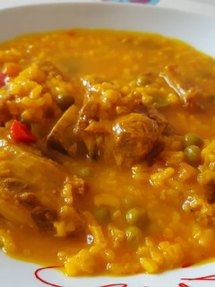 Una foto de Arroz caldoso con costillas y verduras