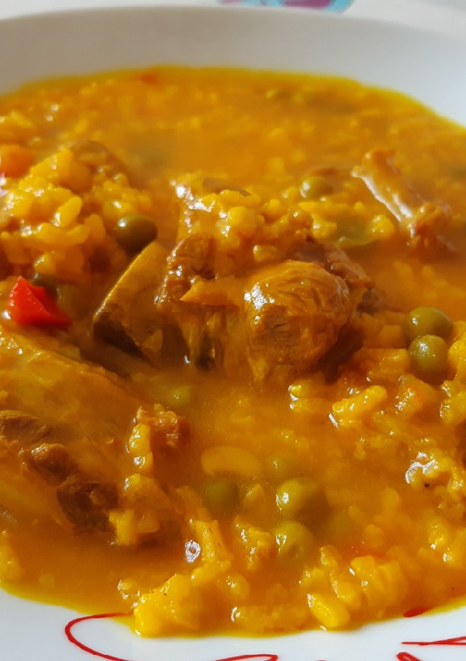 Una foto de Arroz caldoso con costillas y verduras