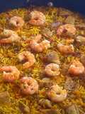 Arroz pilaf con secreto y langostinos