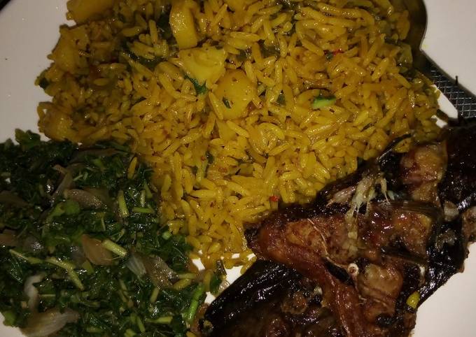 Jollof Rice and Irish with vegetable Sauce and Cat Fish