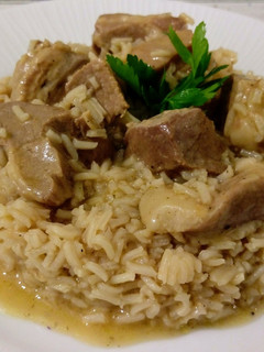 Una foto de Lagarto ibérico de bellota con arroz (cordón que hay entre las costillas y el lomo del cerdo)