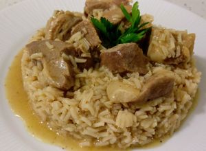 Una foto de Lagarto ibérico de bellota con arroz (cordón que hay entre las costillas y el lomo del cerdo)
