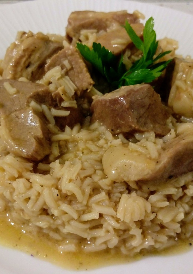 Una foto de Lagarto ibérico de bellota con arroz (cordón que hay entre las costillas y el lomo del cerdo)