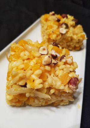 Une photo de Risotto potimarron et noisettes
