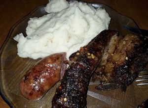 Una foto de Asado y chorizo a las brasas