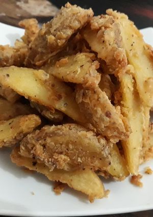 Foto resep Crispy and spicy potato wedges with oregano