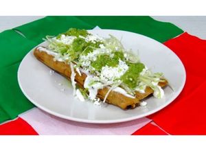 Una foto de Flautas de pollo