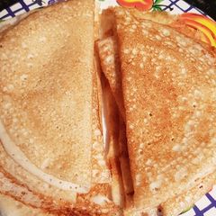 A picture of Dosa (Tosai) - Indian rice crepe.