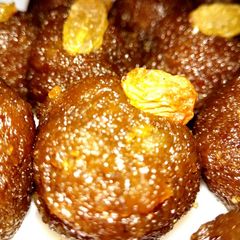 A picture of Coconut Laddu with Date Palm Jaggery(Khejur guder narkel naru).