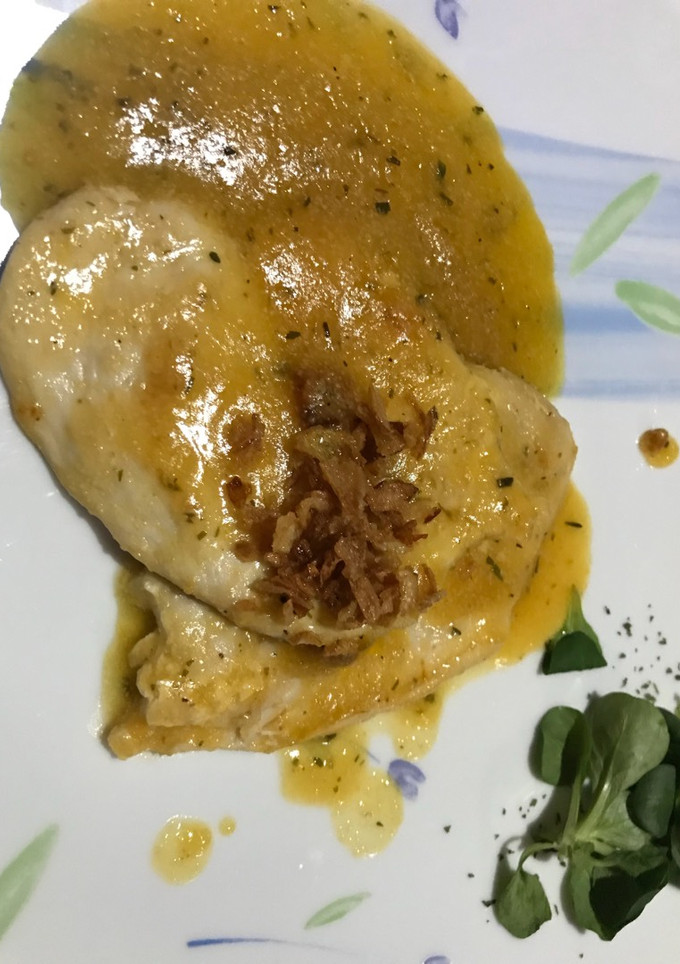 Una foto de Pollo con salsa de naranja