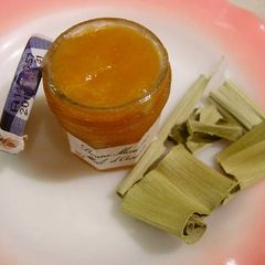 A picture of Homemade Kaya Jam with Pandan Leaves.