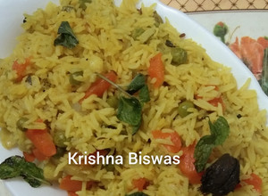 A picture of Pressure  Cooker Basanti  Vegetables  Pulao   .