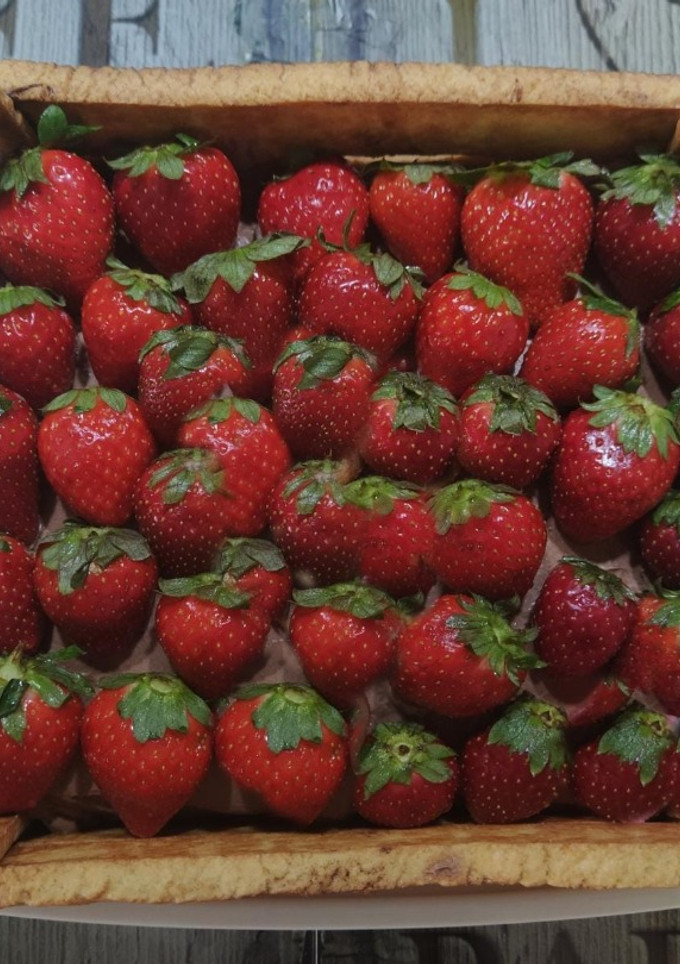 Una foto de Tarta caja fresas