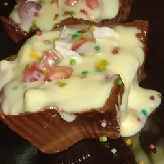 A picture of Fruits & nuts custard in choco cups.