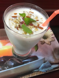 A picture of Khajuri Buttermilk with nuts.