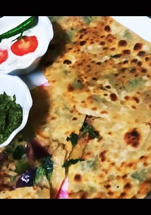 A picture of Half Moon Spanich Green Oinon Crep Paratha.