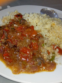 A picture of Cous Cous nd tomatoe sauce.