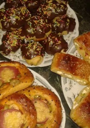 صورة لوصفة فطائر ومينى كرواسون بعجينة الجبنة المثلثات