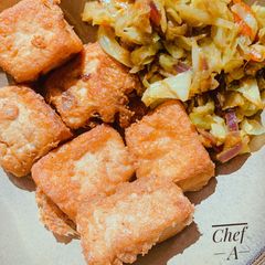 Egg coated Tofu (Awara) and stir fried cabbage sauce A picture of Egg coated Tofu (Awara) and stir fried cabbage sauce.