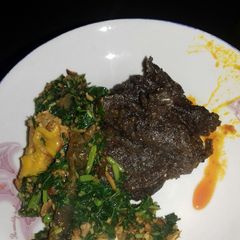 Green soup with Plantain flour /Amala A picture of Green soup with Plantain flour /Amala.