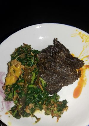 A picture of Green soup with Plantain flour /Amala.