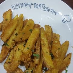 A picture of Chatpatay crispy potato wedges.