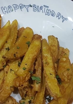 A picture of Chatpatay crispy potato wedges.