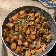 A picture of Tofu with lime leaves.