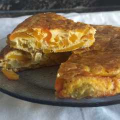 Una foto de Tortilla de zapallo, cebolla y ají