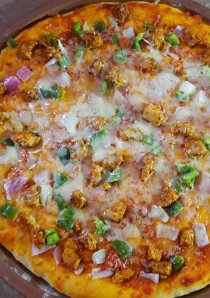 A picture of Homemade Tikka Pizza🍕.