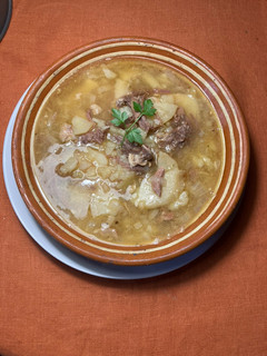Una foto de Guisado con confit de pato y especias Sabor Cookpad