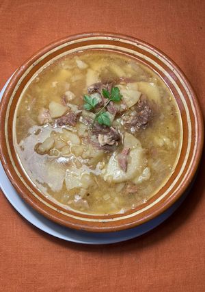 Una foto de Guisado con confit de pato y especias Sabor Cookpad