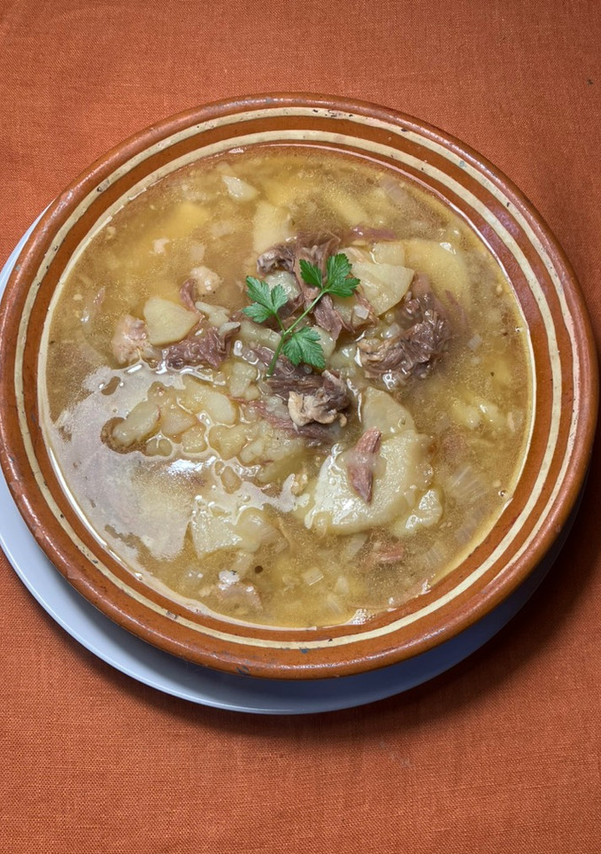 Una foto de Guisado con confit de pato y especias Sabor Cookpad