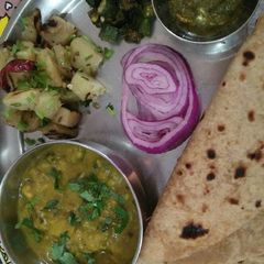 A picture of Lauki ki sabji, bhindi, garlic Celery, palak &parathi.