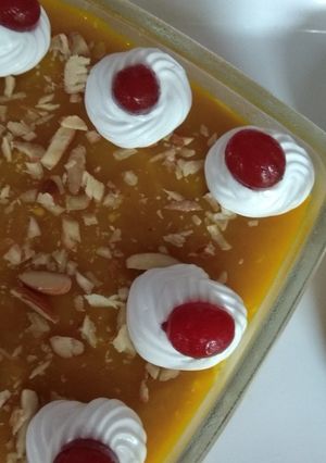 A picture of Mango flavoured milk cake in two layers.