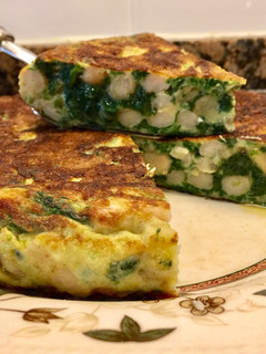 Una foto de Tortilla de judías y espinacas