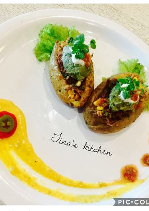 A picture of Quinoa stuffed jacket potatoes.