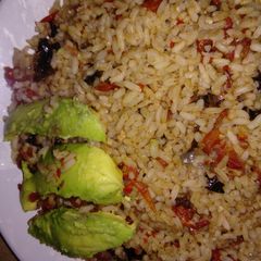 A picture of Jellof rice with Avocado pear.
