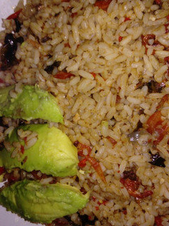 A picture of Jellof rice with Avocado pear.