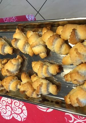 A picture of Mini Appetizer Croissants with Anchovies and Feta.