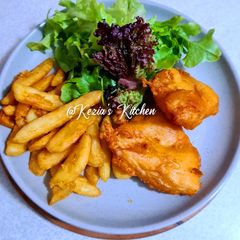 A picture of Batter Fish, Chips and Salad.