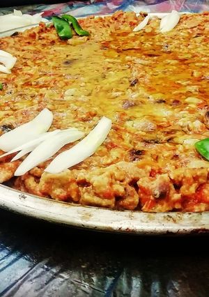صورة لوصفة فتّة البندورة أو المجلله