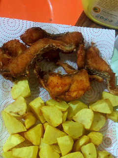 A picture of Fish and roast potatoes.