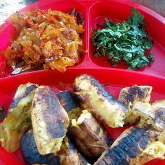 A picture of Roasted plantain with pepper sauce.