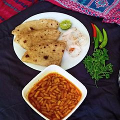 A picture of Khandeshi special zanzanit Sev bhaji(curry).